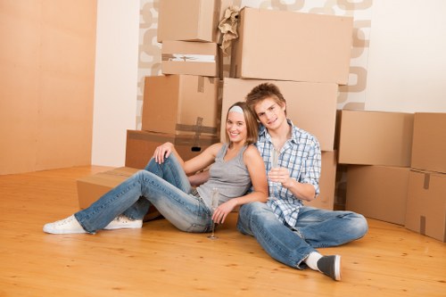 Person organizing belongings in a Loxford storage unit