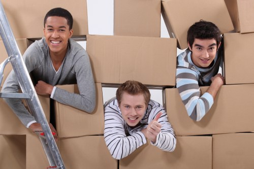 Secure storage facility with stacked furniture and boxes